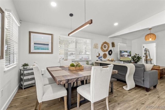 4080 N Eagle Nest Pt, Crystal River, FL 34428 - dining space with light wood-style floors, vaulted ceiling, plenty of natural light, and recessed lighting