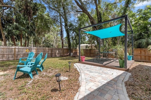 4080 N Eagle Nest Pt, Crystal River, FL 34428 - fenced backyard with a deck