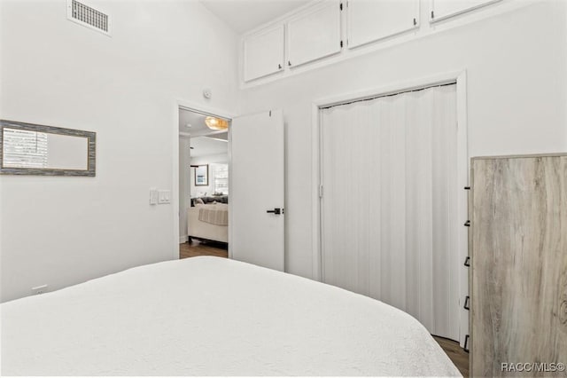 4080 N Eagle Nest Pt, Crystal River, FL 34428 - bedroom featuring dark wood-type flooring and a closet