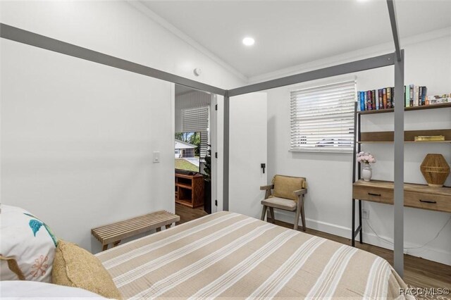 4080 N Eagle Nest Pt, Crystal River, FL 34428 - bedroom featuring wood finished floors, multiple windows, recessed lighting, and ornamental molding