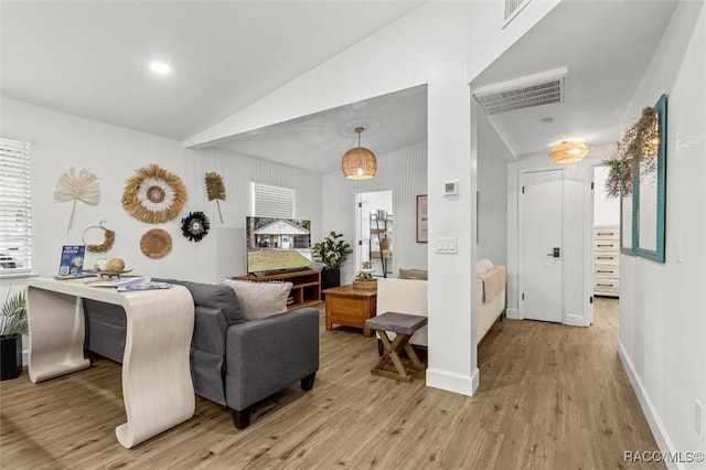 4080 N Eagle Nest Pt, Crystal River, FL 34428 - living area with light wood finished floors and lofted ceiling