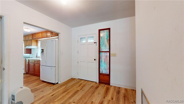 foyer entrance featuring light hardwood / wood-style floors