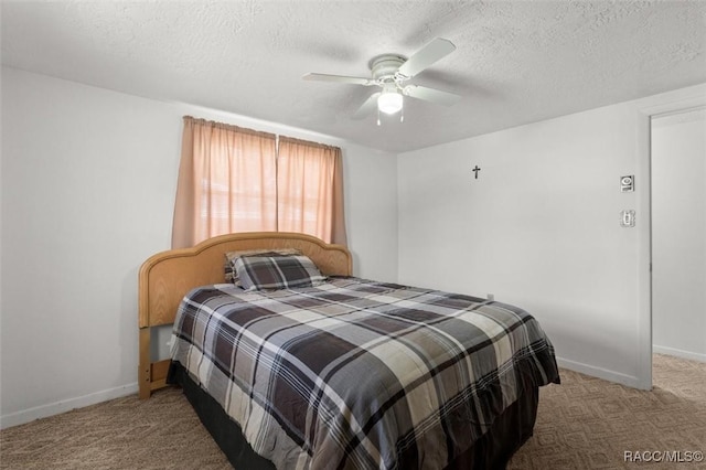2 James St, Beverly Hills, FL 34465 - carpeted bedroom featuring a textured ceiling and a ceiling fan