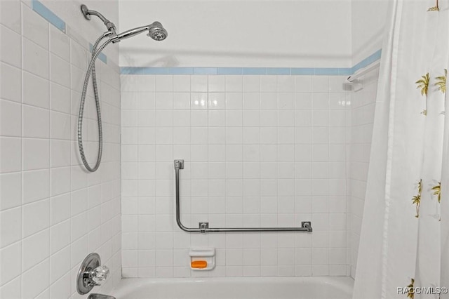 2 James St, Beverly Hills, FL 34465 - bathroom featuring shower / bath combination with curtain
