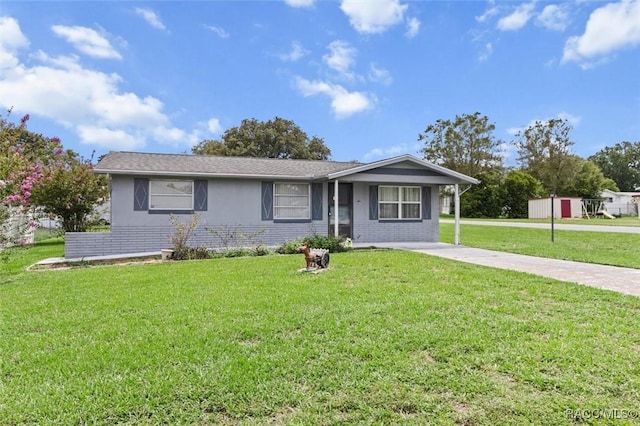 2 James St, Beverly Hills, FL 34465 - single story home featuring a front lawn, brick siding, driveway, and stucco siding