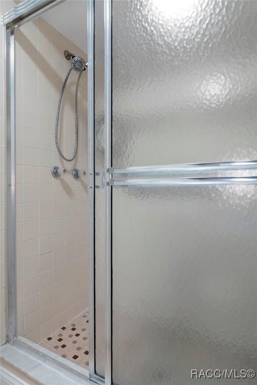 bathroom with a stall shower