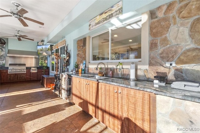 view of patio / terrace with grilling area, sink, and area for grilling