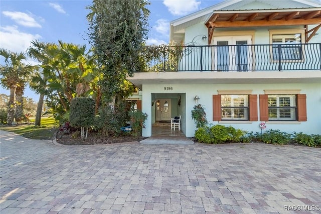 exterior space with a balcony