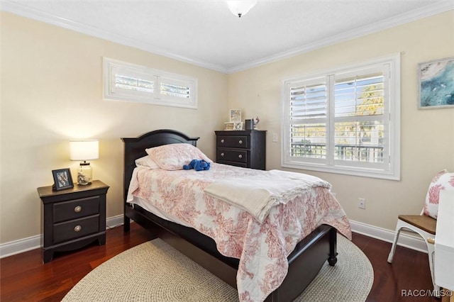 bedroom with dark hardwood / wood-style flooring and ornamental molding