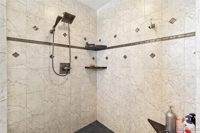 bathroom featuring a tile shower