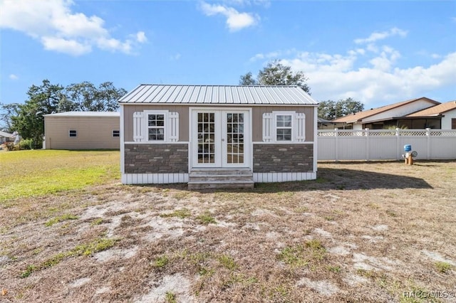 exterior space with a yard