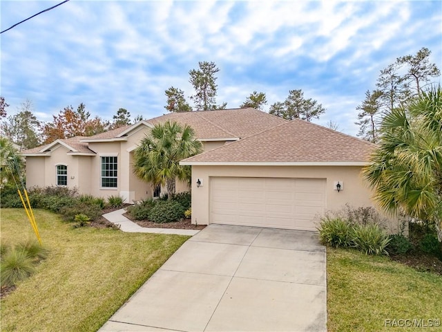 view of front of property with roof with shingles, stucco siding, an attached garage, a front yard, and driveway