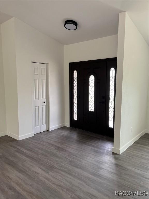 12186 Lamont Dr, Spring Hill, FL 34608 - tiled empty room with a textured ceiling, ceiling fan, and lofted ceiling