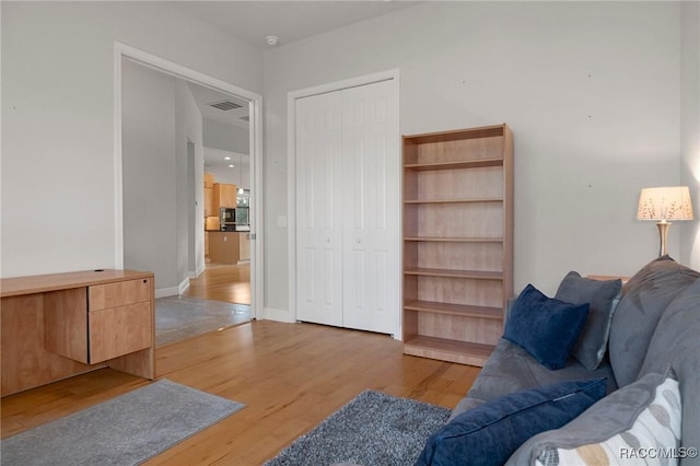 living room with light hardwood / wood-style floors