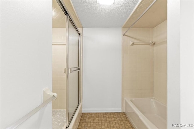 bathroom featuring a textured ceiling