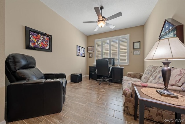 office area featuring a textured ceiling and ceiling fan