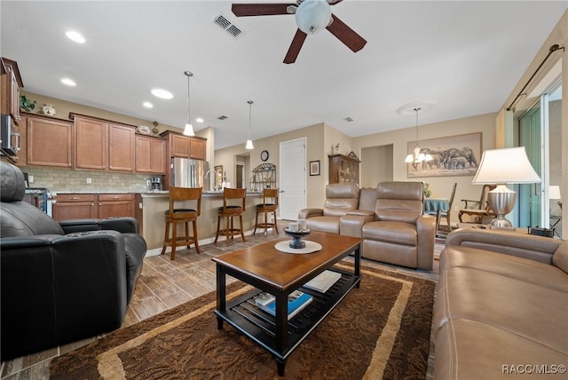 living room with ceiling fan