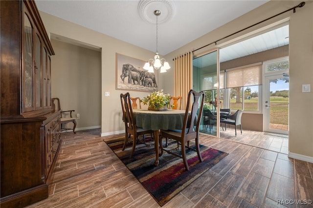 dining area with a notable chandelier