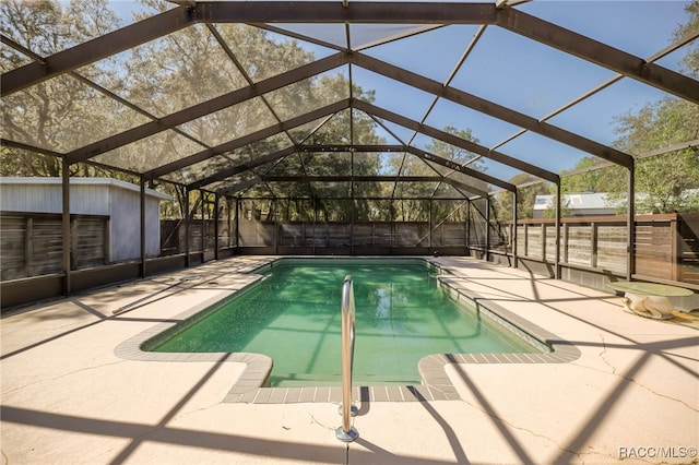 view of pool featuring a fenced in pool, a lanai, a patio area, and a fenced backyard