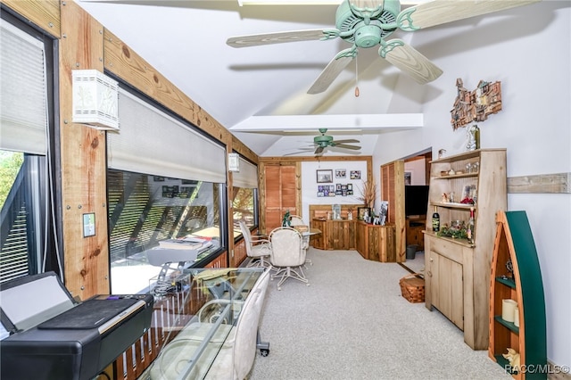 interior space featuring lofted ceiling with beams and ceiling fan