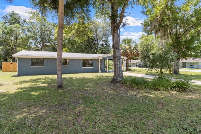 view of yard with a carport