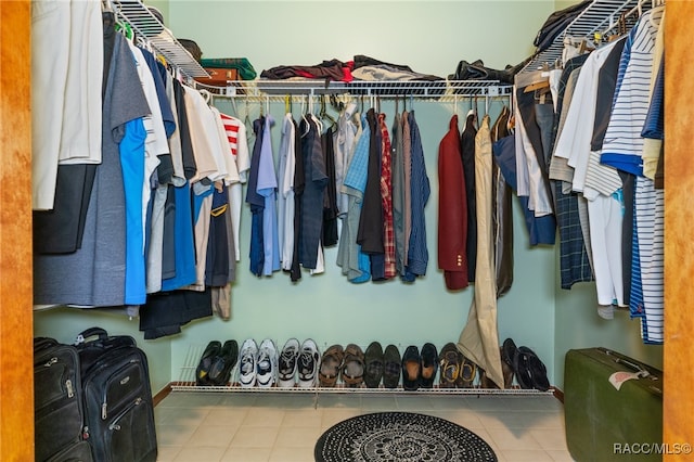 walk in closet featuring tile patterned floors