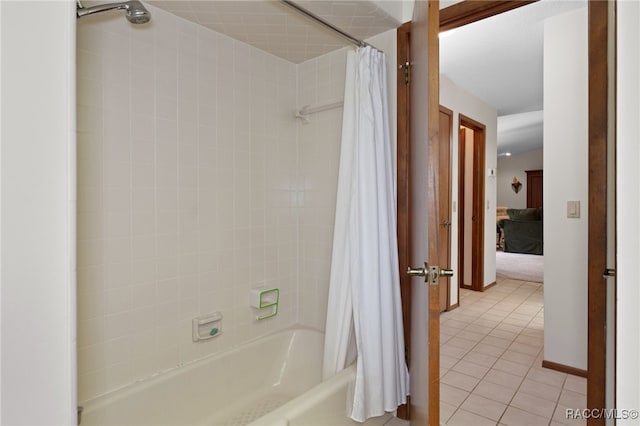 bathroom featuring tile patterned flooring and shower / bath combination with curtain