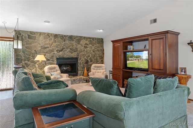 living room with a stone fireplace, carpet, and lofted ceiling