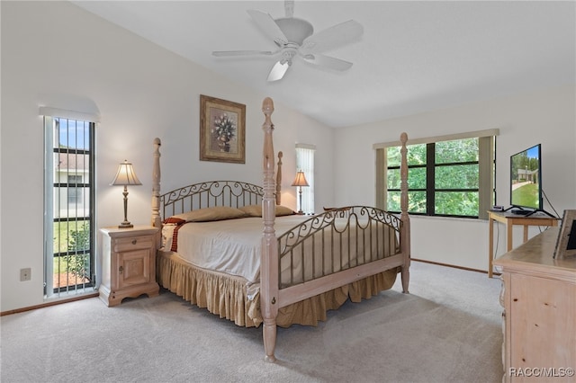 bedroom featuring light colored carpet and ceiling fan