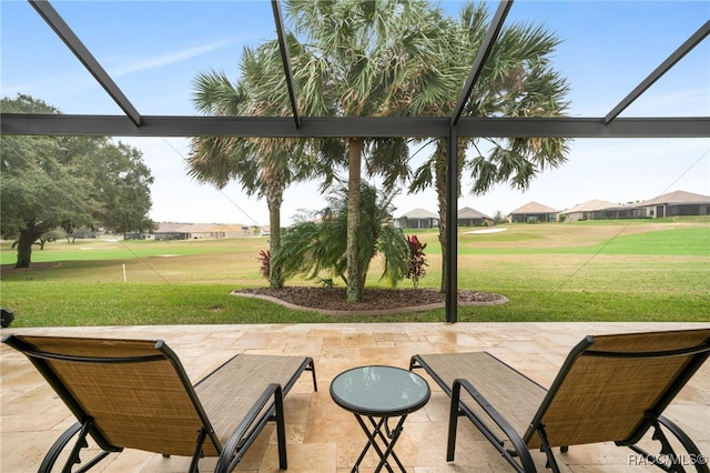 view of patio / terrace with a lanai