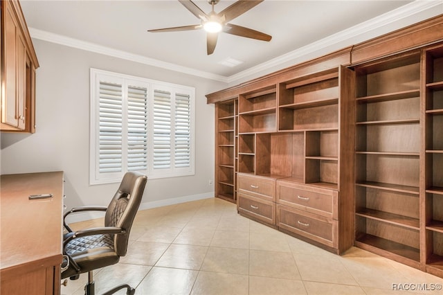 unfurnished office featuring light tile patterned flooring, ceiling fan, and crown molding