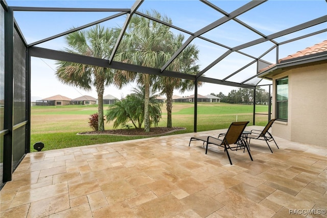 view of patio / terrace with a lanai