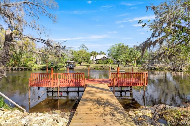 view of dock featuring a water view