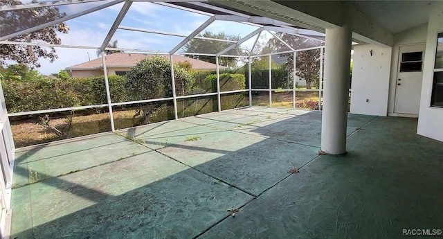 view of patio / terrace with a lanai