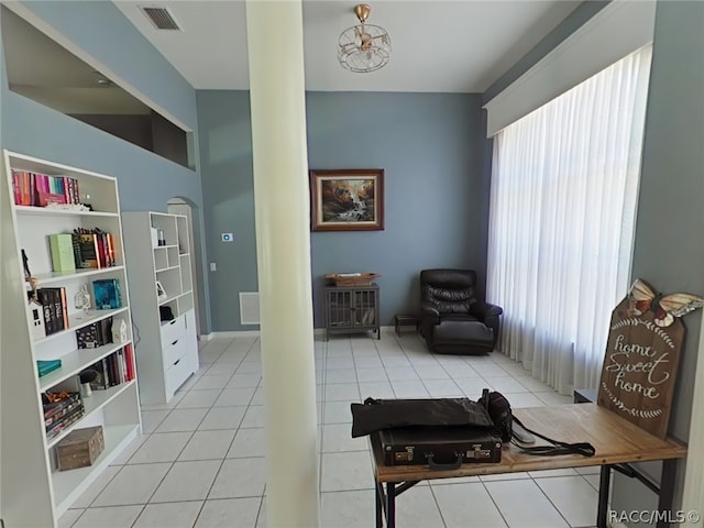 sitting room featuring light tile patterned floors