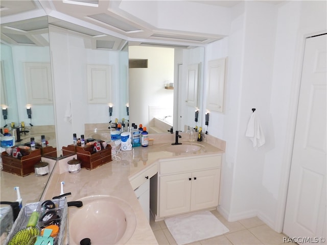 bathroom featuring tile patterned flooring and vanity