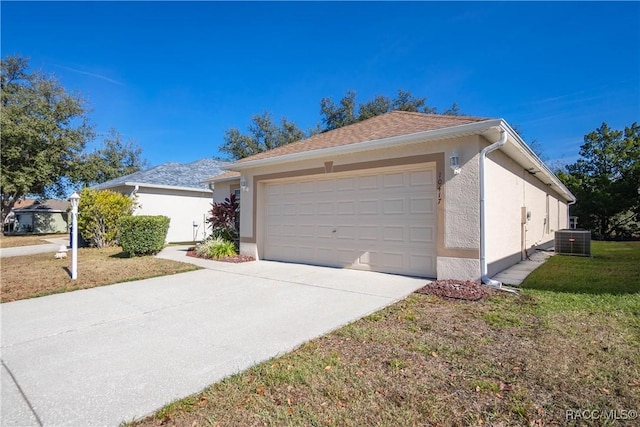 view of property exterior featuring central air condition unit, a lawn, and a garage