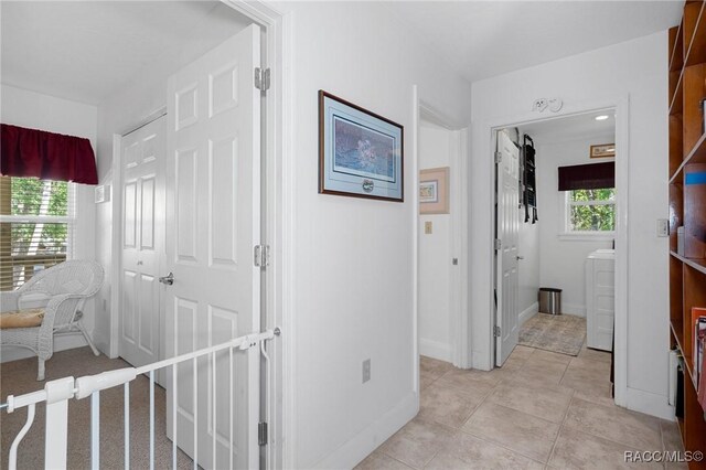 carpeted bedroom featuring multiple windows and ceiling fan