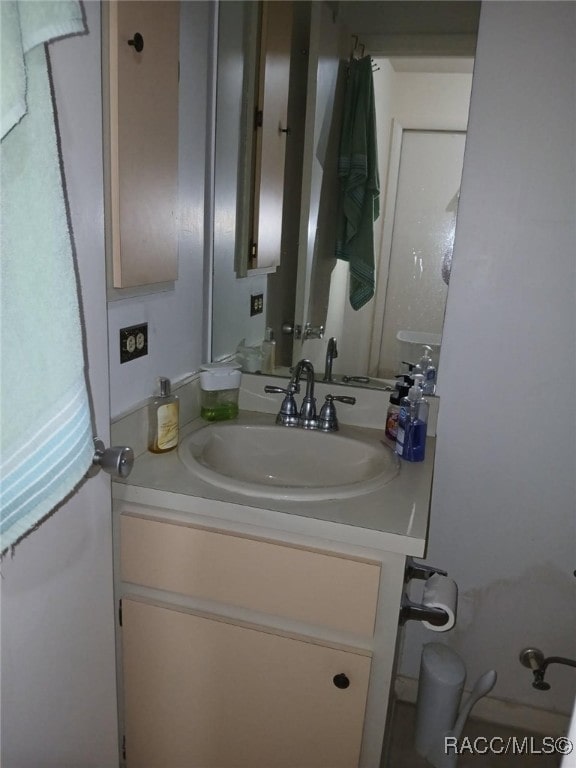 half bathroom with vanity