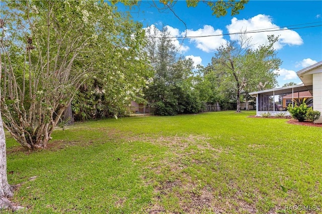 4325 NE 33rd Ave, Ocala, FL 34479 - view of yard featuring a sunroom