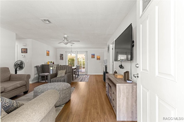 4325 NE 33rd Ave, Ocala, FL 34479 - living room with a ceiling fan and light wood finished floors