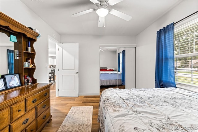4325 NE 33rd Ave, Ocala, FL 34479 - bedroom with a closet, wood finished floors, and a ceiling fan
