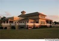 view of outdoor building at dusk