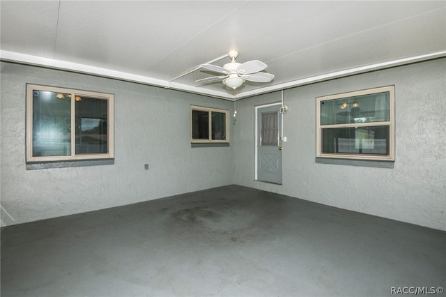 view of patio / terrace featuring ceiling fan