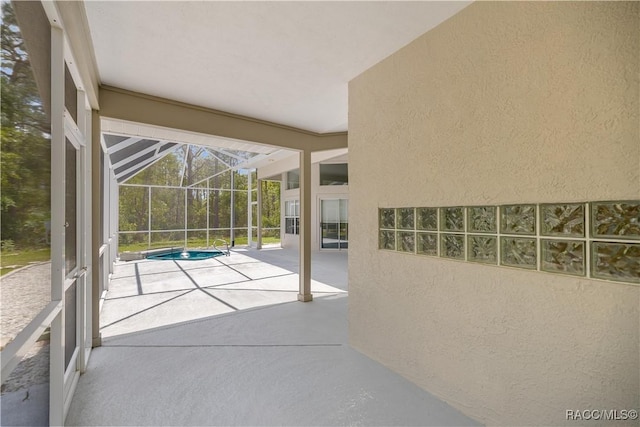 5725 N Durango Ter, Beverly Hills, FL 34465 - view of patio / terrace with an outdoor pool and a lanai
