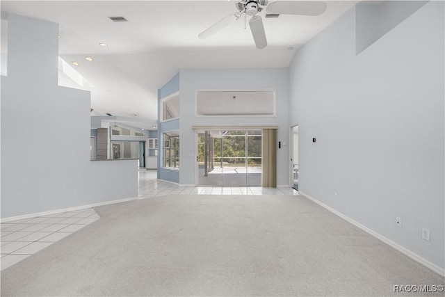5725 N Durango Ter, Beverly Hills, FL 34465 - unfurnished living room with high vaulted ceiling, ceiling fan, carpet flooring, tile patterned floors, and recessed lighting