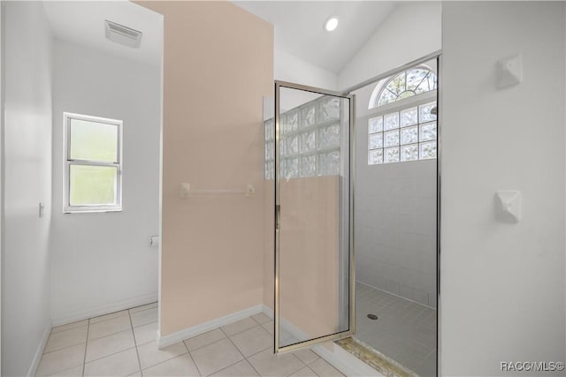 5725 N Durango Ter, Beverly Hills, FL 34465 - full bathroom with healthy amount of natural light, a shower stall, tile patterned flooring, lofted ceiling, and recessed lighting