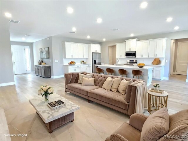 2645 N Annapolis Ave, Hernando, FL 34442 - living room with baseboards and recessed lighting