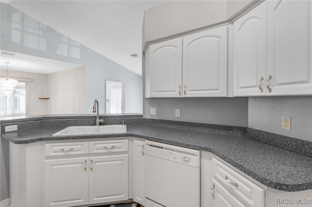 kitchen featuring kitchen peninsula, white cabinetry, sink, and white dishwasher