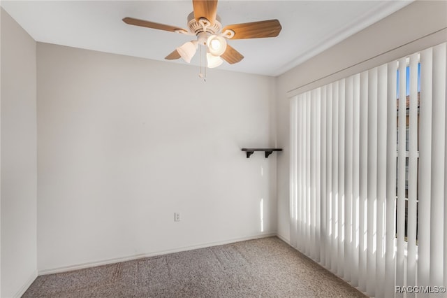 unfurnished room featuring carpet flooring and ceiling fan